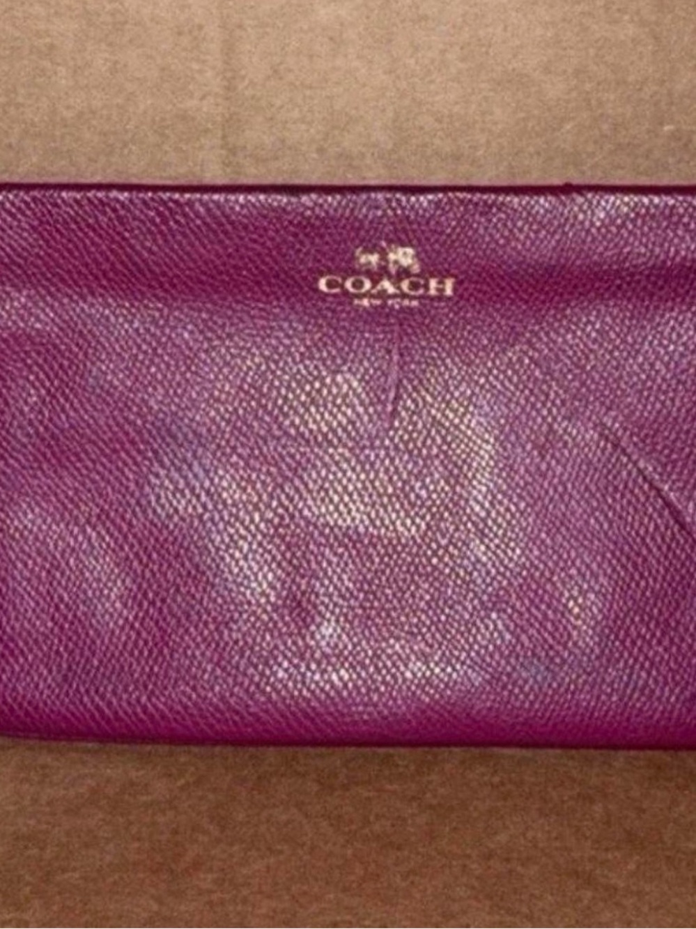 COACH Leather Zip wristlet in Plum Purple with Gold Logo